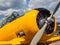 Vintage Yellow Propeller Aircraft