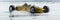 Vintage Yellow Race Car: A Thrilling Snowy Adventure