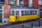 Vintage yellow tram, symbol of Lisbon, Portugal