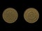 Vintage Yugoslavian 10 dinar coins on a black background.