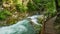 Vintgar gorge, Slovenia. River near the Bled lake with wooden tourist paths, bridges above river and waterfalls.