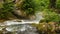 Vintgar gorge, Slovenia. River near the Bled lake with wooden tourist paths, bridges above river and waterfalls.