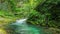 Vintgar gorge, Slovenia. River near the Bled lake with wooden tourist paths, bridges above river and waterfalls.