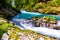 Vintgar gorge, Slovenia. River near the Bled lake with wooden tourist paths, bridges above river and waterfalls. Hiking in the Tri