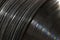 Vinyl LP Record grooves for musical background. Before streaming, Long Playing records were the musical medium standard