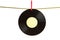 Vinyl record on gold rope