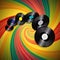 Vinyl records over multicolor vintage swirl background