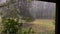 Violent storms sweep through heavy rain porch view pan