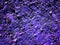 Violet color land texture looking like lunar surface or another planet surface