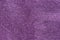 Violet creased metallic foil background texture