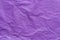 Violet creased paper tissue background texture