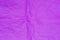 Violet creased tissue paper background texture