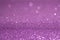 Violet glitter bokeh background