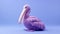 Violet Knitted Pelican Sculpture On Blue Background