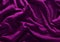 Violet silk texture. Wrinkle fabric background