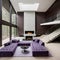 Violet-tufted sofa in a large, lavish room with a staircase and fireplace