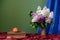 Violet and white lilacs in a vase of ceramics