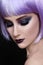Violet wig and sparkly make-up