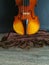 Violin on brown folded scarf