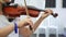 Violin classic musical instrument. Classical player hands. Details of violin