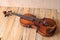 A violin image on the wood background