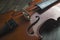 Violin lying on wooden background