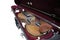 Violin in an open case on a white background