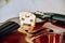 Violin parts. Bow first on white marble background. Selective focus