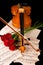 Violin sheet music and rose closeup wood