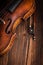 Violin waist detail on rustic wooden background