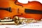 Violoncello and alto saxophone on musical notes