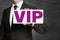 Vip sign is held by businessman