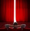 VIP sitting in front of slightly open movie theater red curtain 3d illustration