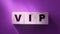 VIP Very Important Person text on wooden cubes on red. Business concept