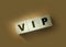 VIP Very Important Person text on wooden cubes on red. Business concept