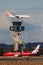 Virgin Blue Airlines Boeing 737 taxis with a Virgin Australia 737 on approach to land behind