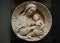Virgin and Child with a border of cherubim, after a marble original by Benedetto da Maiano at the V&A Museum