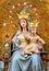 Virgin Mary with baby Jesus, crowned, blessing