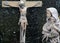 Virgin Mary with baby Jesus looks at Jesus crucified on the cross, Cemetery in Hohenberg, Germany