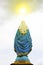 Virgin Mary statue with cloud background