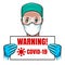 Virologist doctor holds a COVID 19 Warning Sign