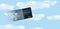 Virtual credit cards are seen pixelated and flying into clouds and blue sky in this illustration about digital credit cards or clo