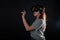 Virtual experience, a young woman using virtual reality glasses,