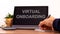 Virtual onboarding symbol. Tablet with words virtual onboarding. Online business and onboarding during COVID-19 quarantine.