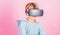 Virtual reality future technology. Discover virtual reality. Kid boy wear vr glasses pink background. Child boy play