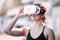 Virtual reality glasses, woman and outdoor game adventure with vr headset, ai software and metaverse technology, Gamer