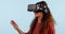 Virtual reality, headphones and gaming, woman in digital world and press screen, 3D experience on blue background