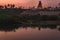 Virupaksha Temple hampi india karnakata at sunset with the river reflection in the