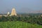 Virupaksha Temple among mountains and palm plantations on sunrise