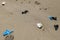 Virus mask and plastic gloves garbage on sea shore line,coronavirus covid pollution